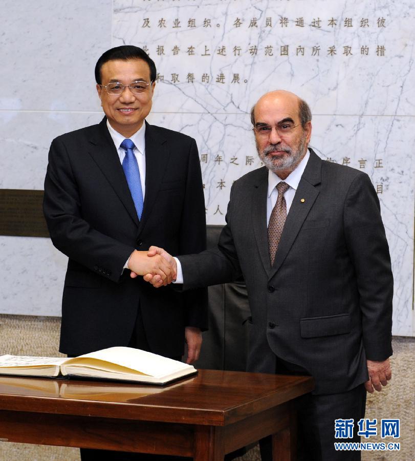 10月15日，中國國務院總理李克強在羅馬會見聯(lián)合國糧農(nóng)組織總干事格拉齊亞諾。 新華社記者 饒愛民 攝