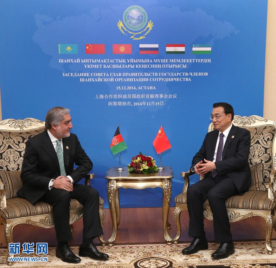 12月15日，中國國務(wù)院總理李克強在阿斯塔納會見阿富汗首席執(zhí)行官阿卜杜拉。 新華社記者 龐興雷 攝