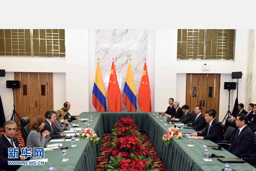 11月18日，國家主席習(xí)近平在菲律賓馬尼拉會見哥倫比亞總統(tǒng)桑托斯。 新華社記者 饒愛民 攝