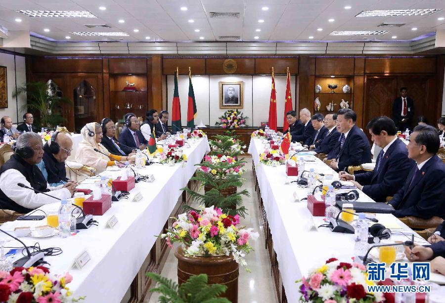 10月14日，國家主席習(xí)近平在達(dá)卡同孟加拉國總理哈西娜舉行會談。 新華社記者劉衛(wèi)兵攝 