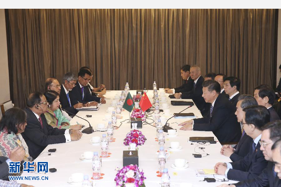 10月14日，國家主席習近平在達卡會見孟加拉國國民議會議長喬杜里。 新華社記者龐興雷攝 