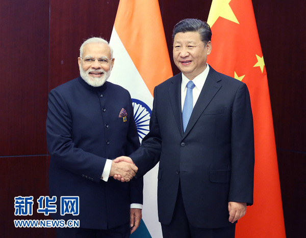 6月9日，國家主席習(xí)近平在阿斯塔納會(huì)見印度總理莫迪。 新華社記者姚大偉 攝