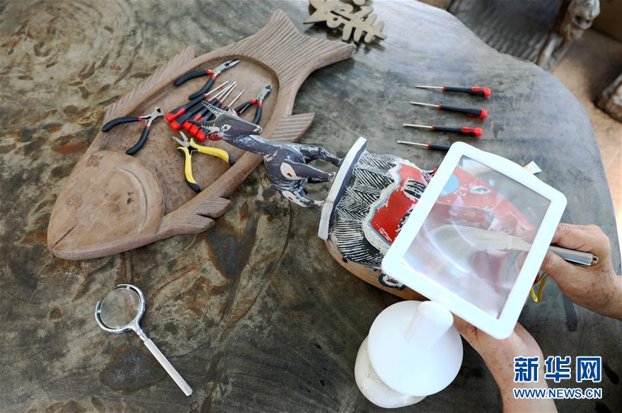 (國際·圖文互動(dòng))(6)通訊:收藏“非洲之美”的中國人——訪幾內(nèi)亞灣非洲國際藝術(shù)博物館館長謝燕申