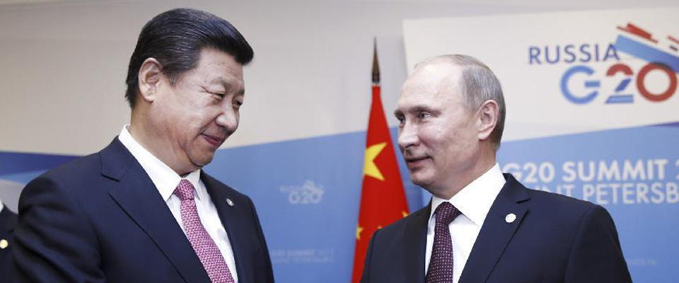 2013年9月，習(xí)近平在圣彼得堡會(huì)見(jiàn)普京